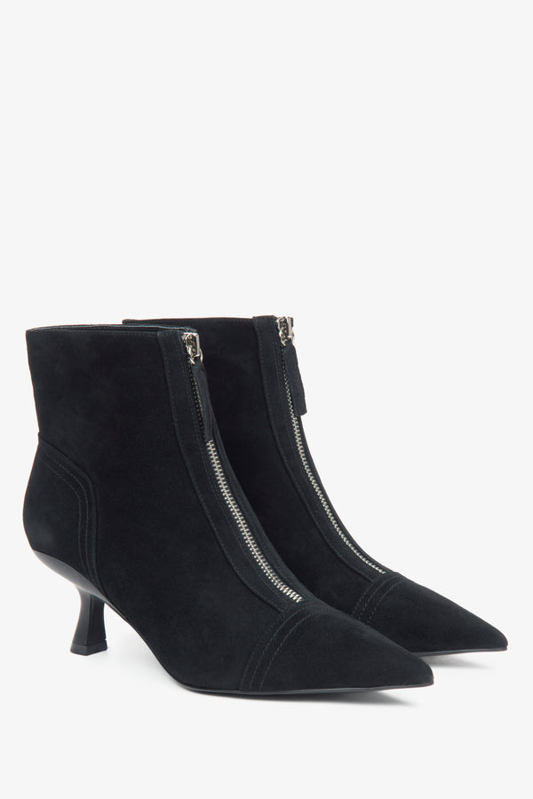 Black women's ankle boots made of natural velour with a low stiletto heel by Estro.