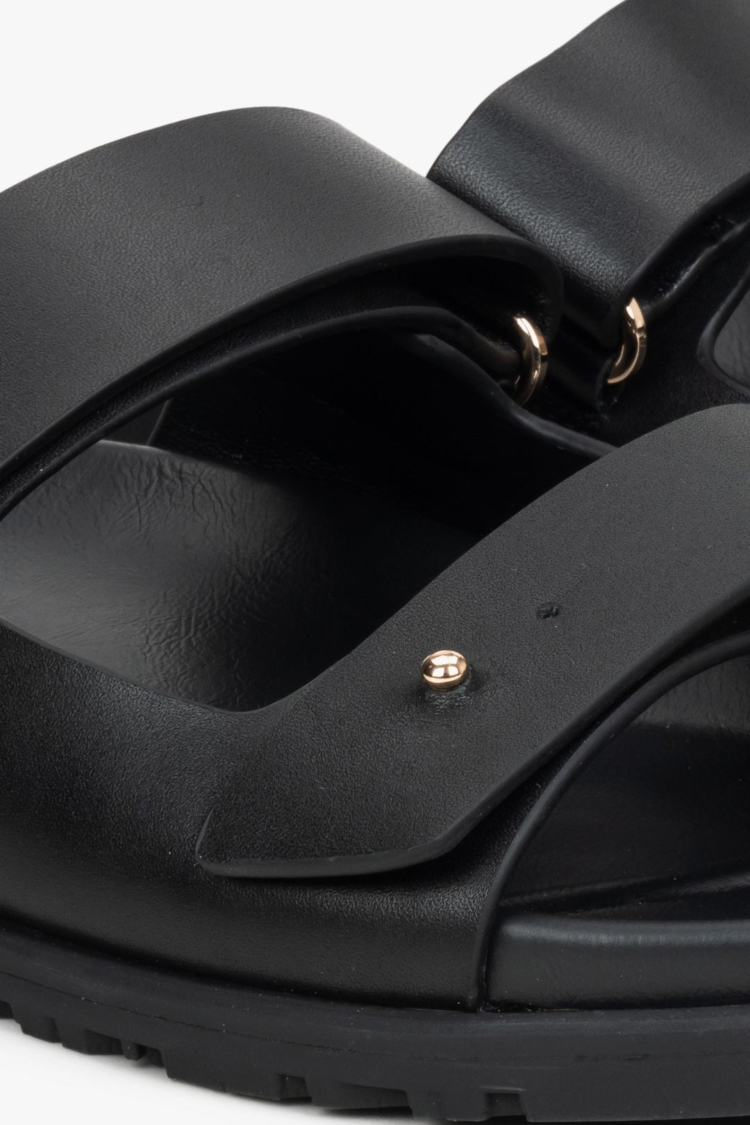 Women's black  leather slides by Estro - close-up on details.