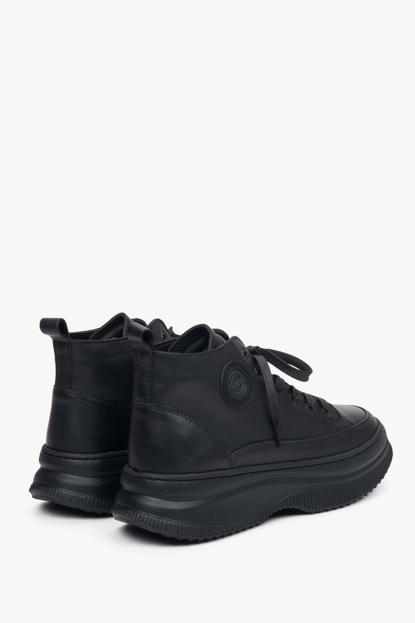 Stylish black women's high-top senakers for Fall - a close-u0 on heel counter and shoe sideline.