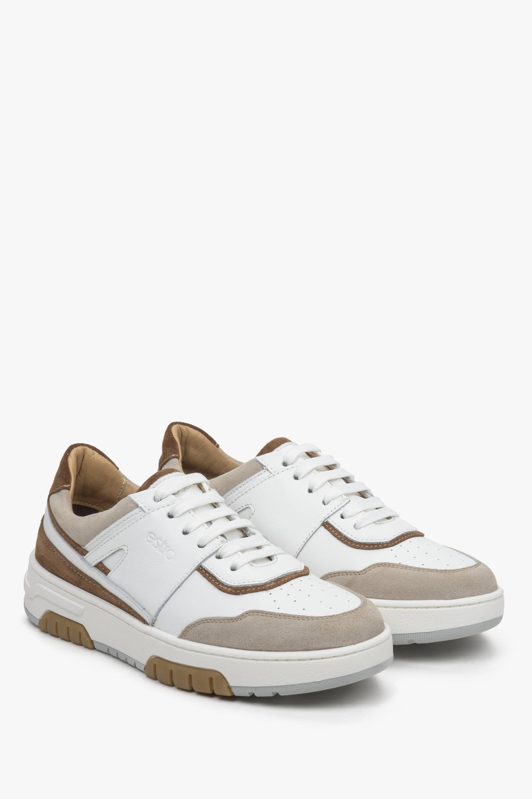 Women's beige and white sneakers by Estro.