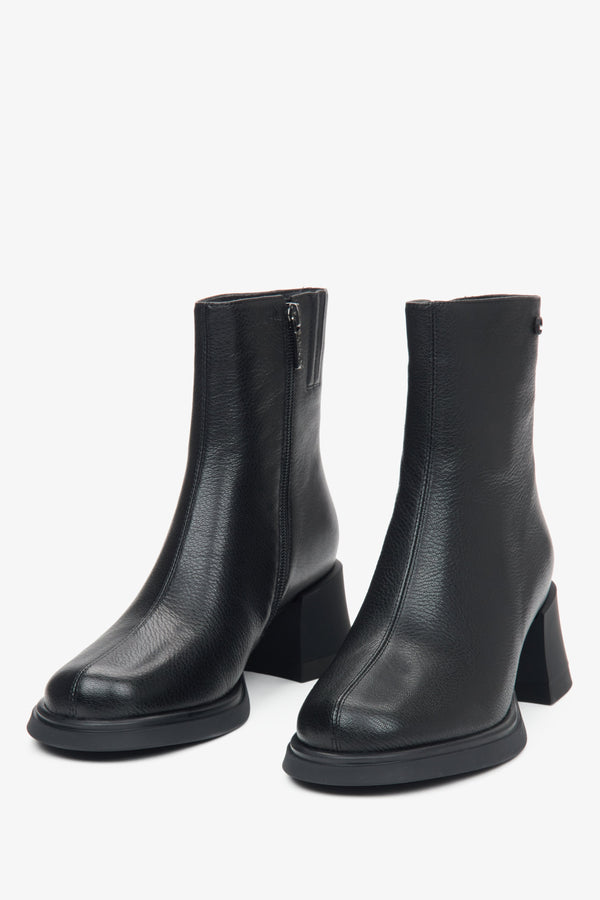 Women's black leather ankle boots with a square toe by Estro - front view of the shoes.