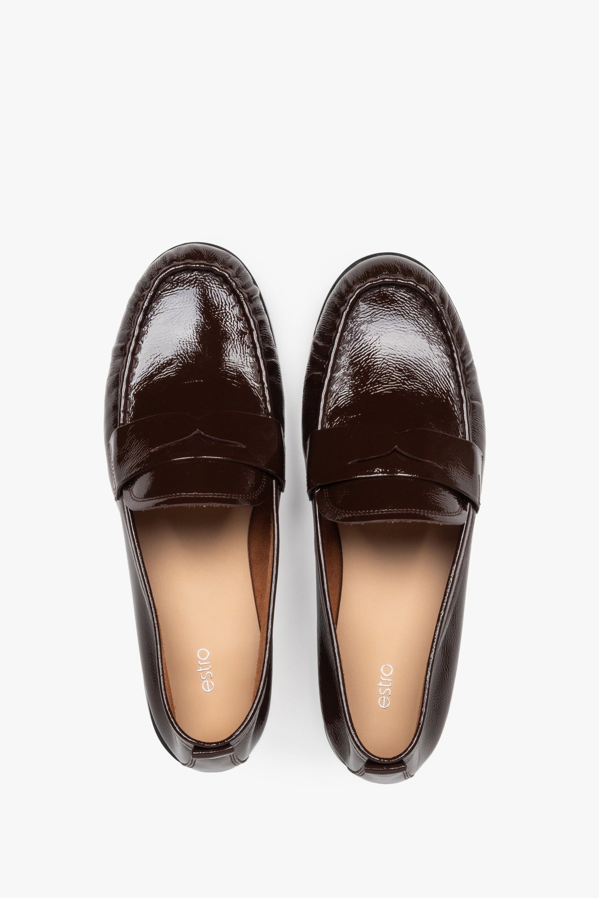 Elegant dark brown women's loafers made of patent leather by Estro.