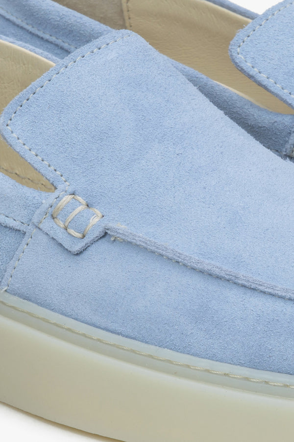 Blue  velour women's loafers - a close-up on details.