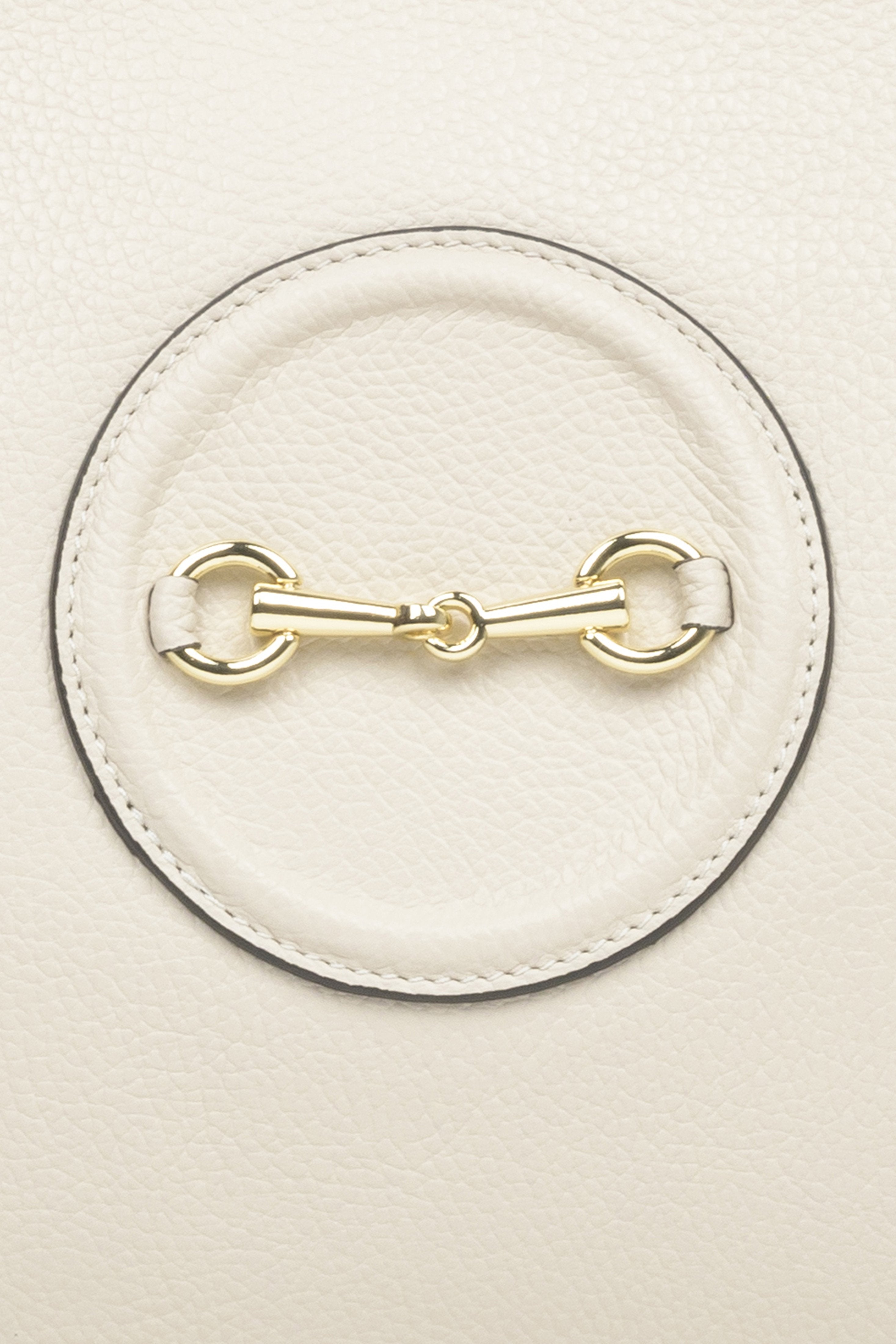 Spacious, light beige leather women's handbag by Estro with gold accents - close-up on the details.