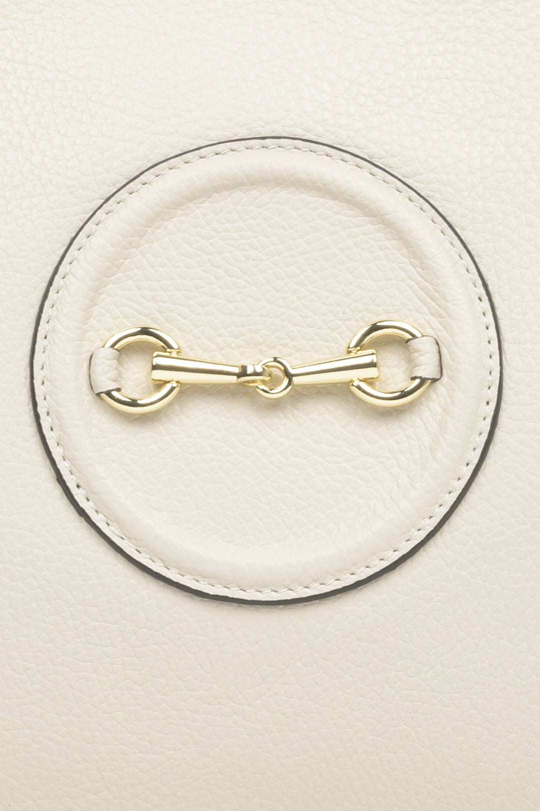 Spacious, light beige leather women's handbag by Estro with gold accents - close-up on the details.