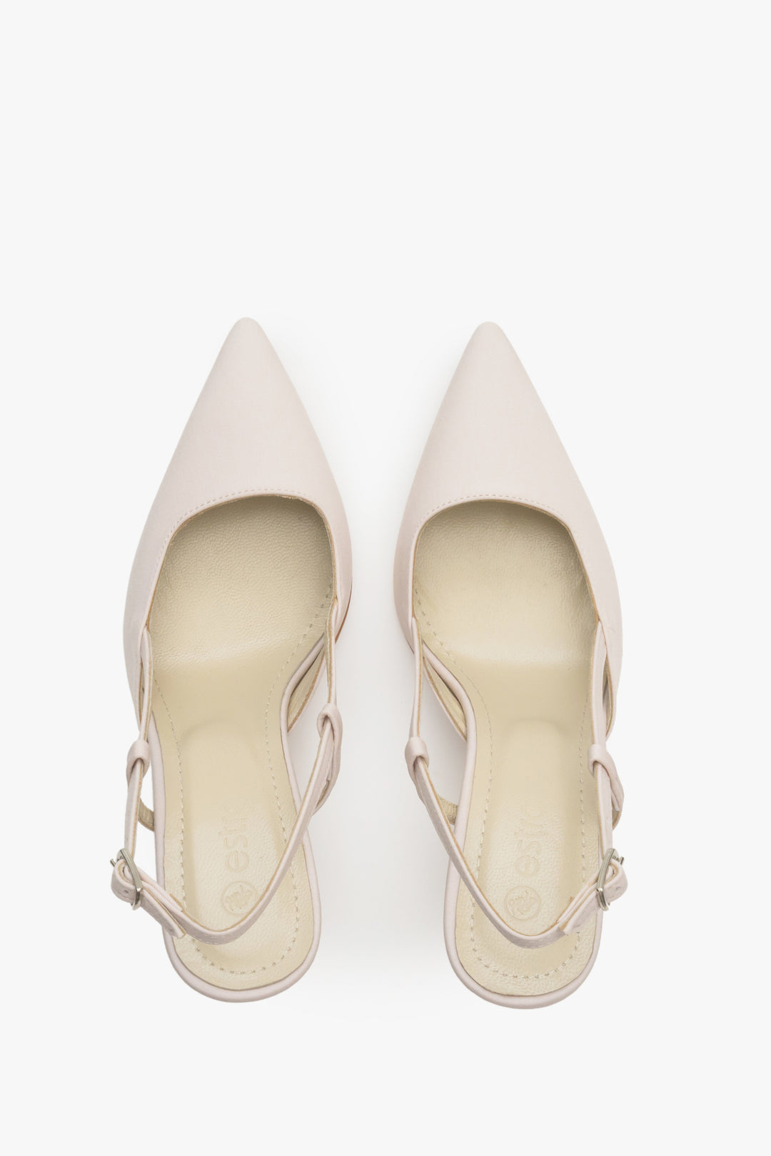 Light beige slingback women's shoes on a heel with pointed toe.