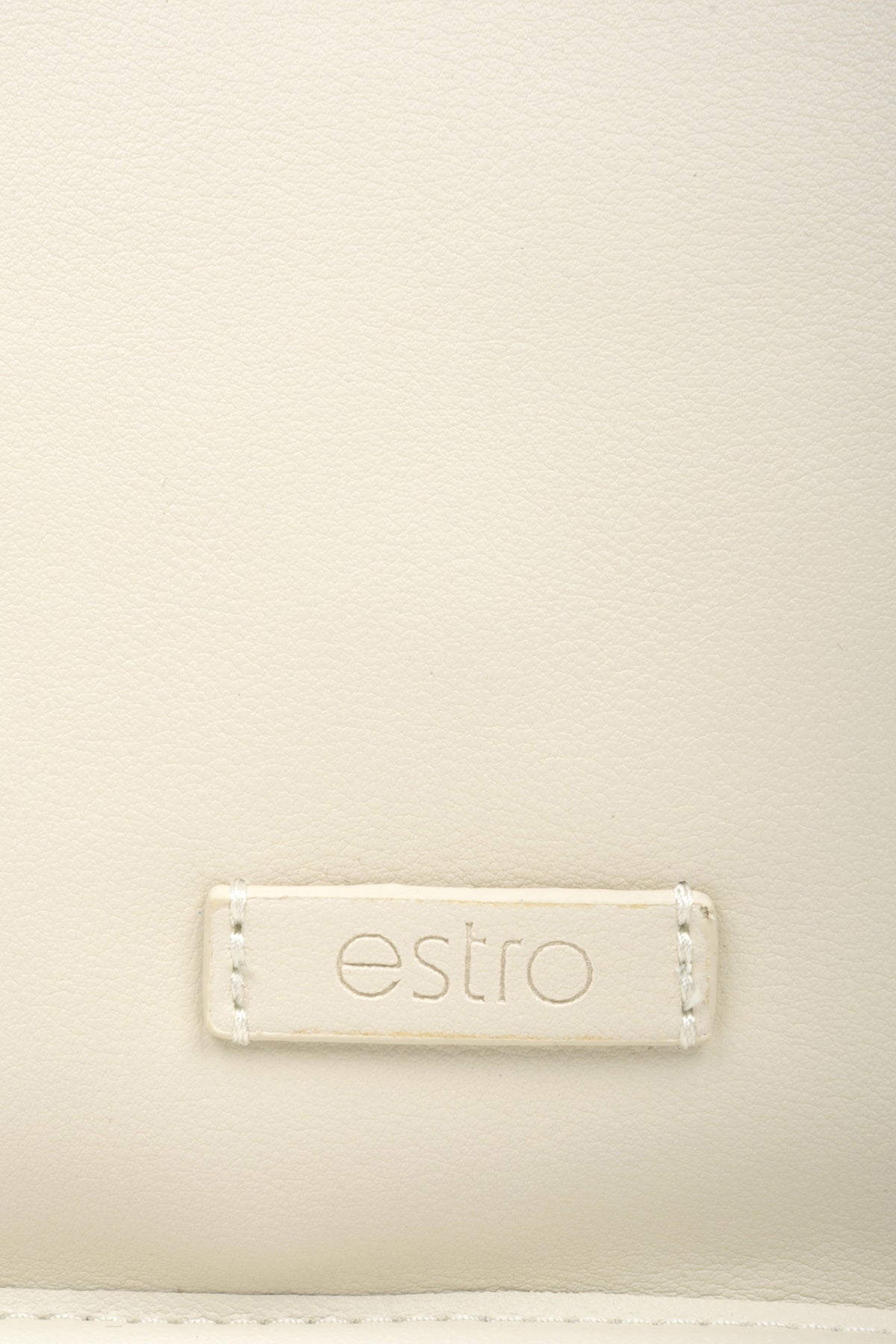 Women's light beige leather shoulder bag - close-up on the details.