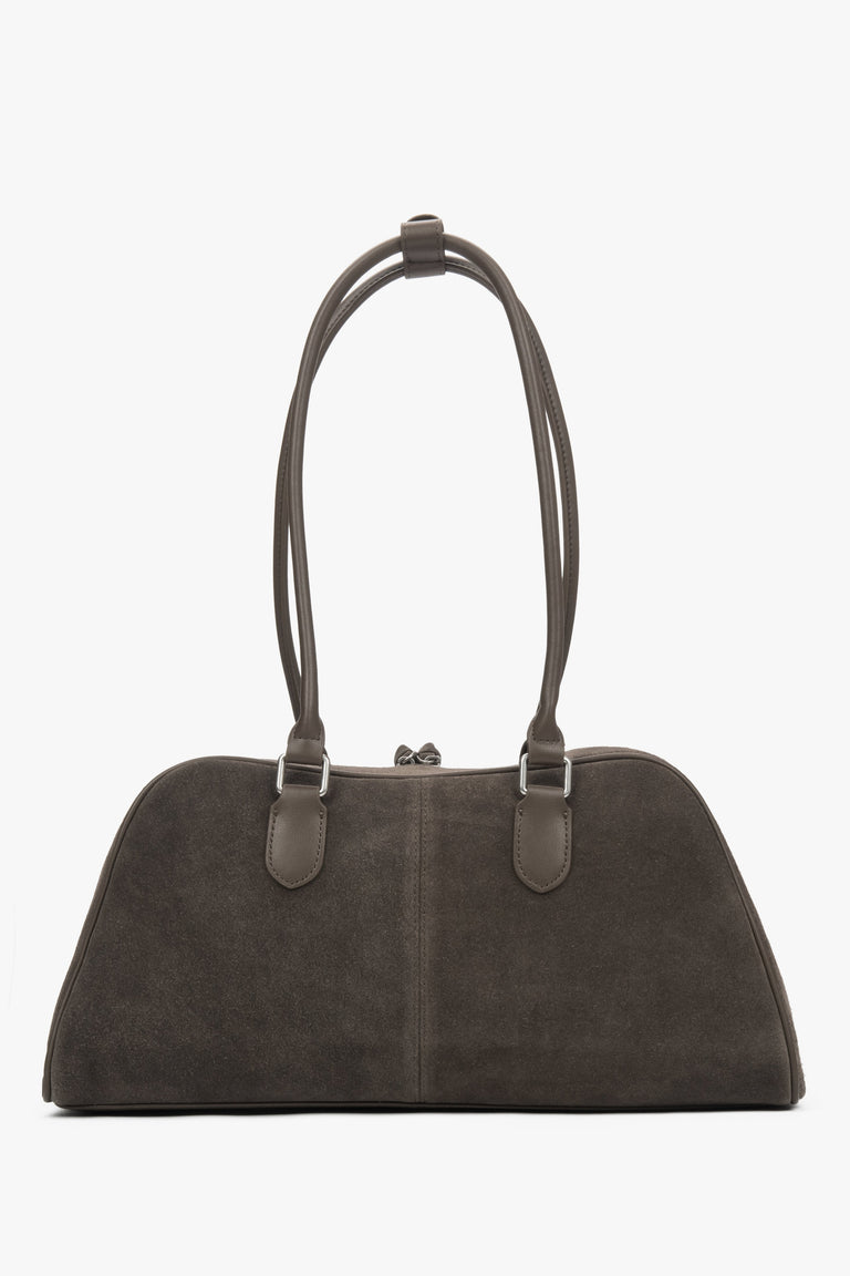 A women's shoulder bag by Estro, crafted from soft beige and grey velour with long handles for comfort.