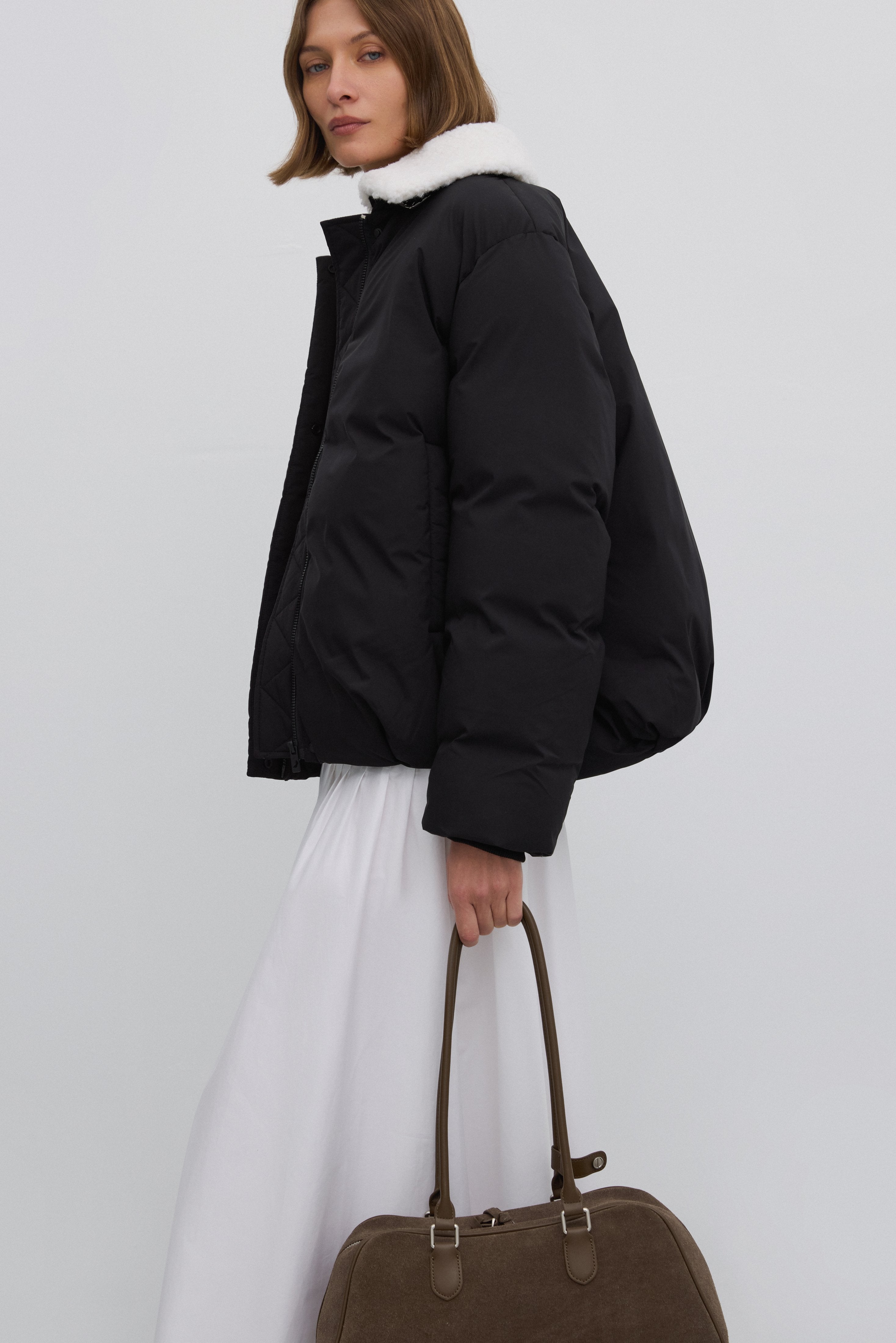 Women's Estro shoulder bag in a two-tone beige and grey velour finish with extended handles.