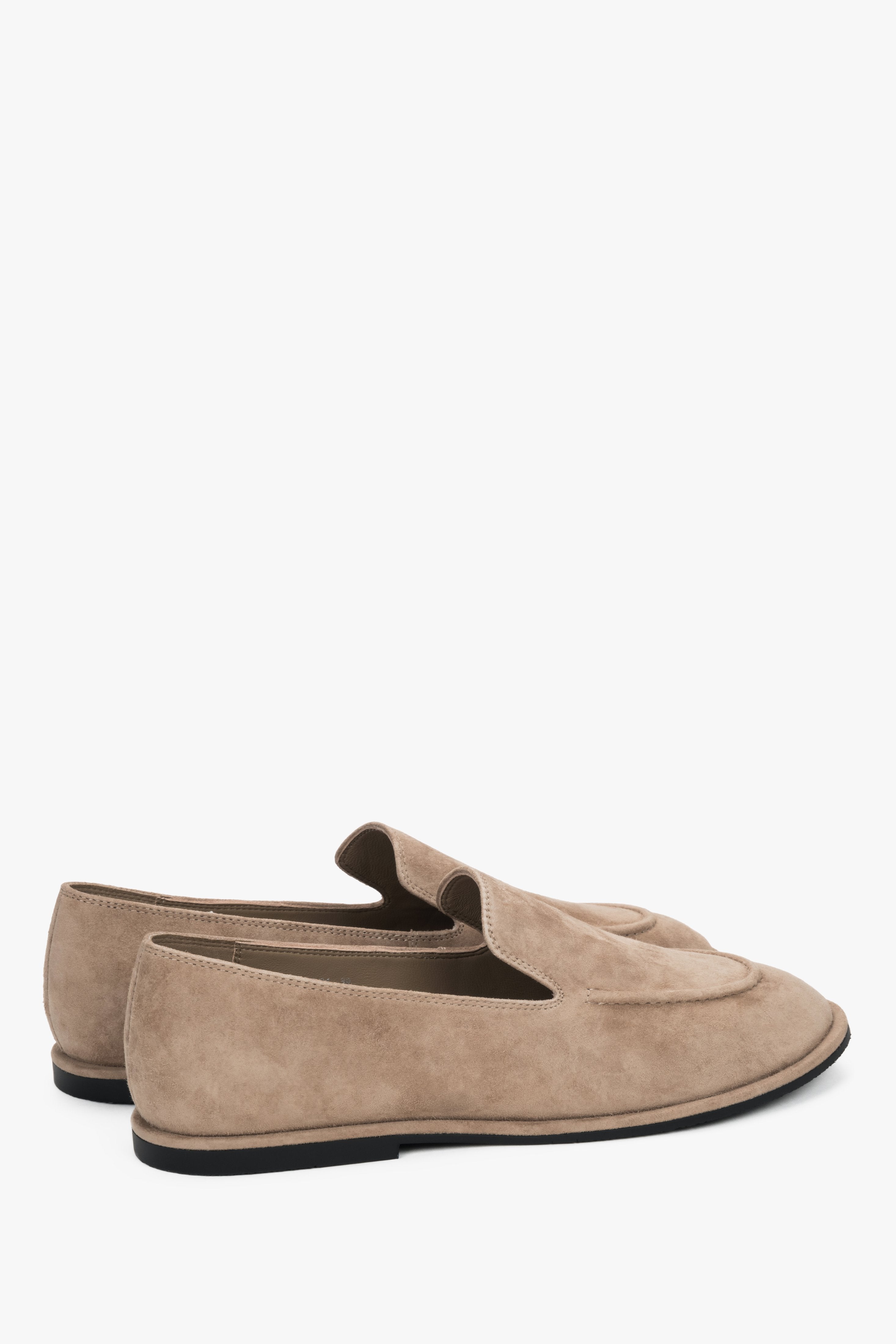 Side profile of the women's Estro flat loafer, showing the beige genuine suede finish.