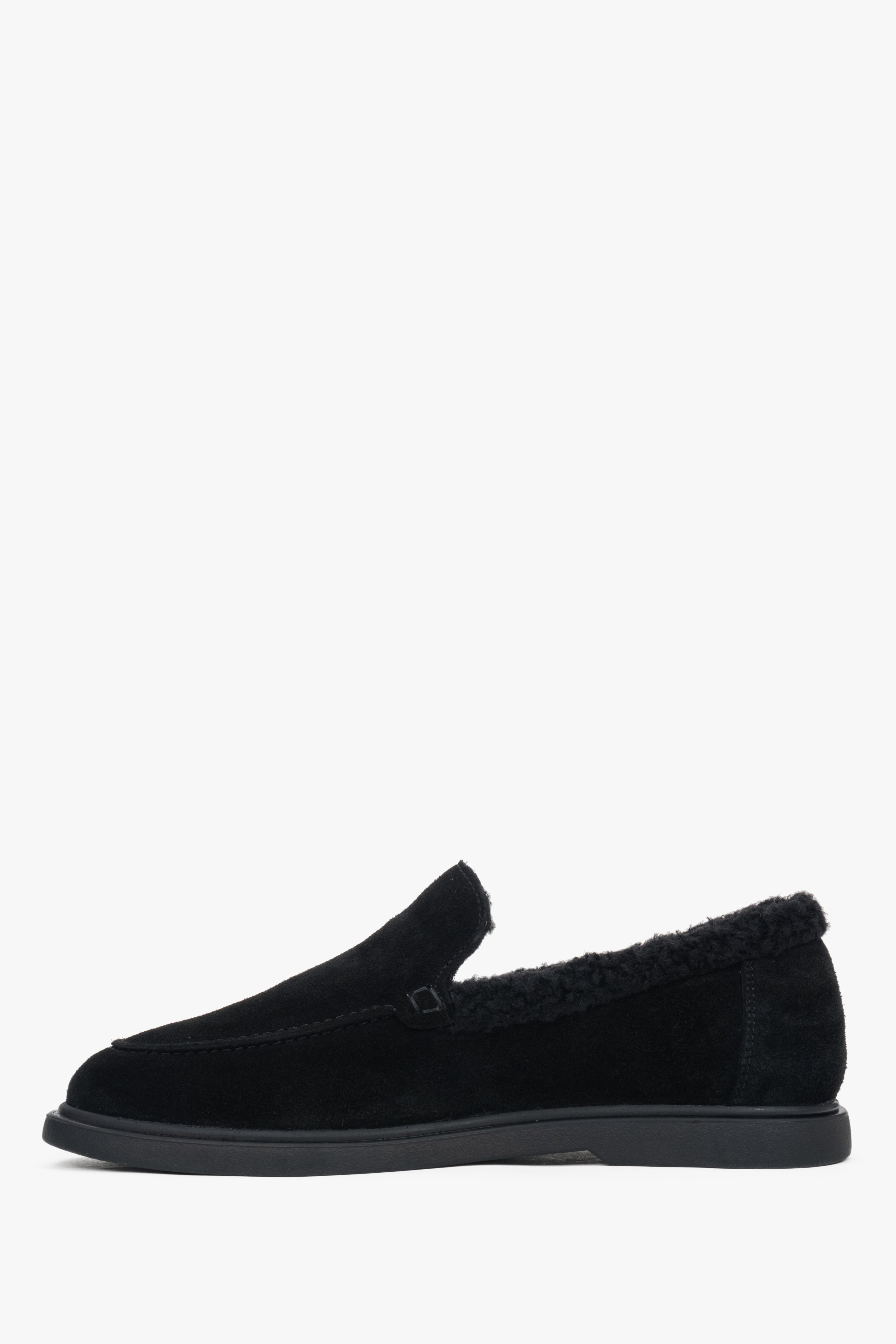 A pair of women's black loafers, crafted from velour and lined with soft fur.