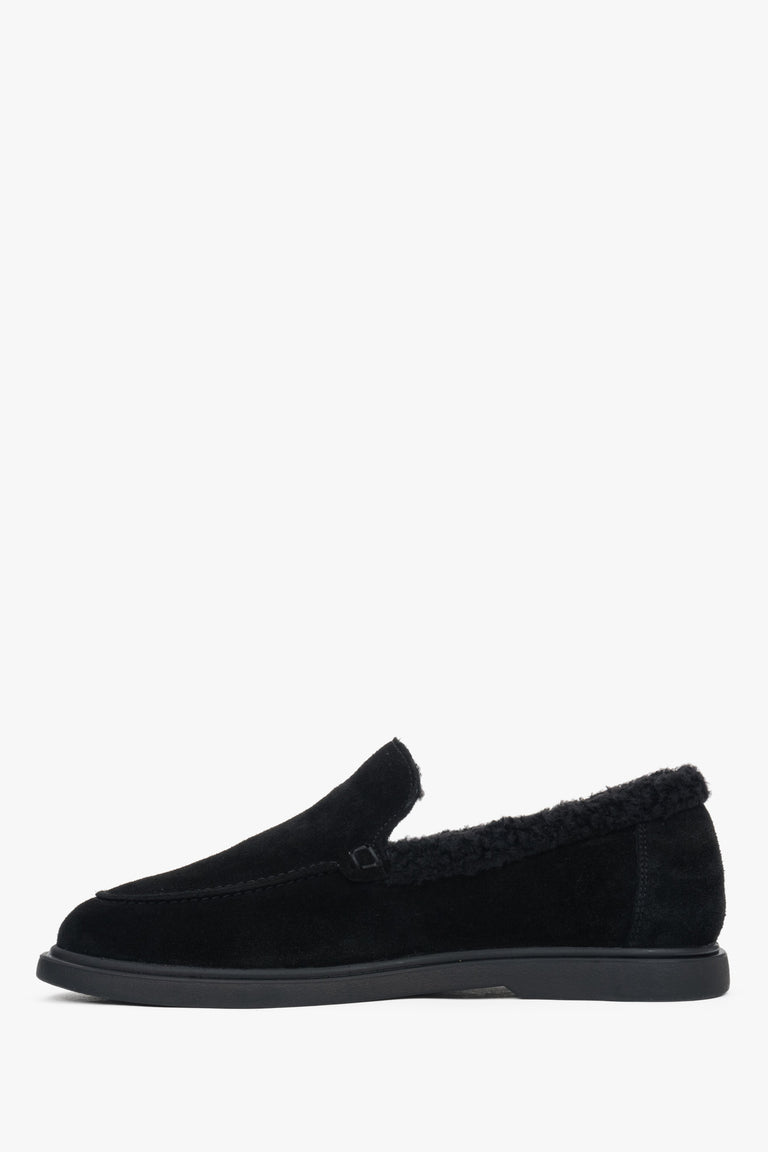 A pair of women's black loafers, crafted from velour and lined with soft fur.