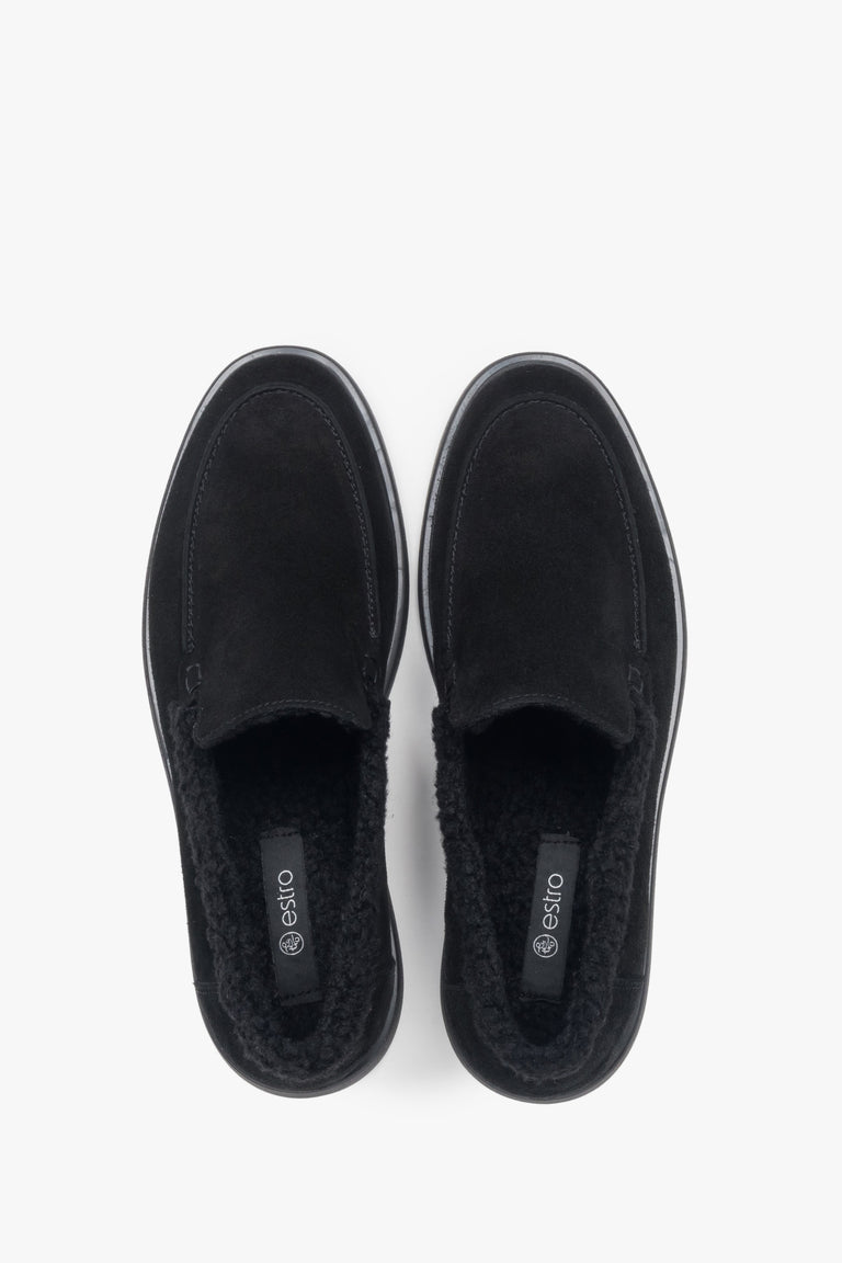 A pair of women's black velour loafers designed with a warm fur lining by Estro.