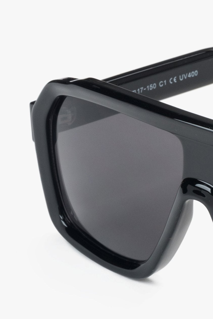 Women's black geometric frame sunglasses by Estro.