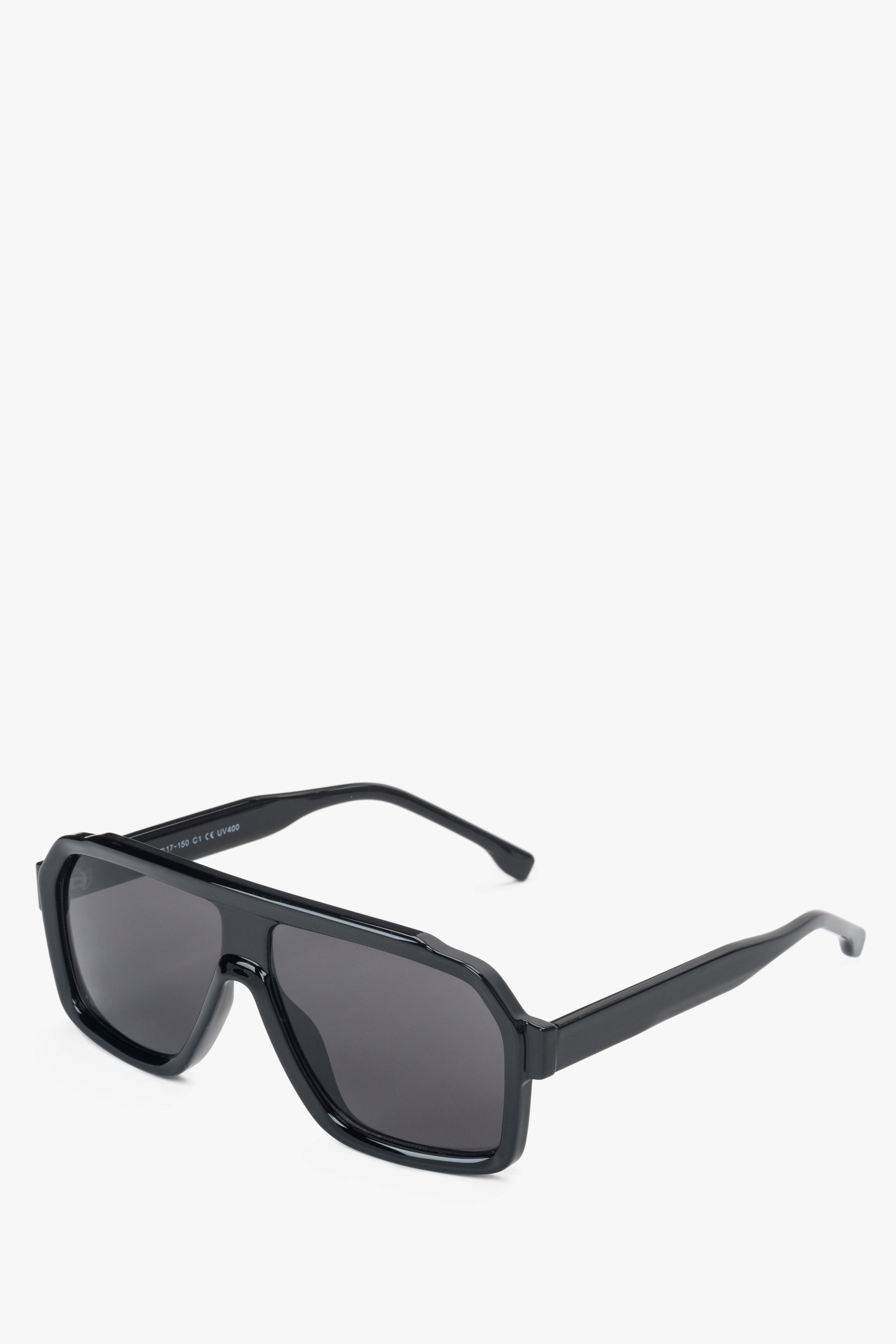 A pair of women's sunglasses by Estro, featuring a black geometric frame.