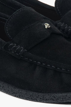 A pair of women's black loafers made from premium Italian velour from the Estro collection.