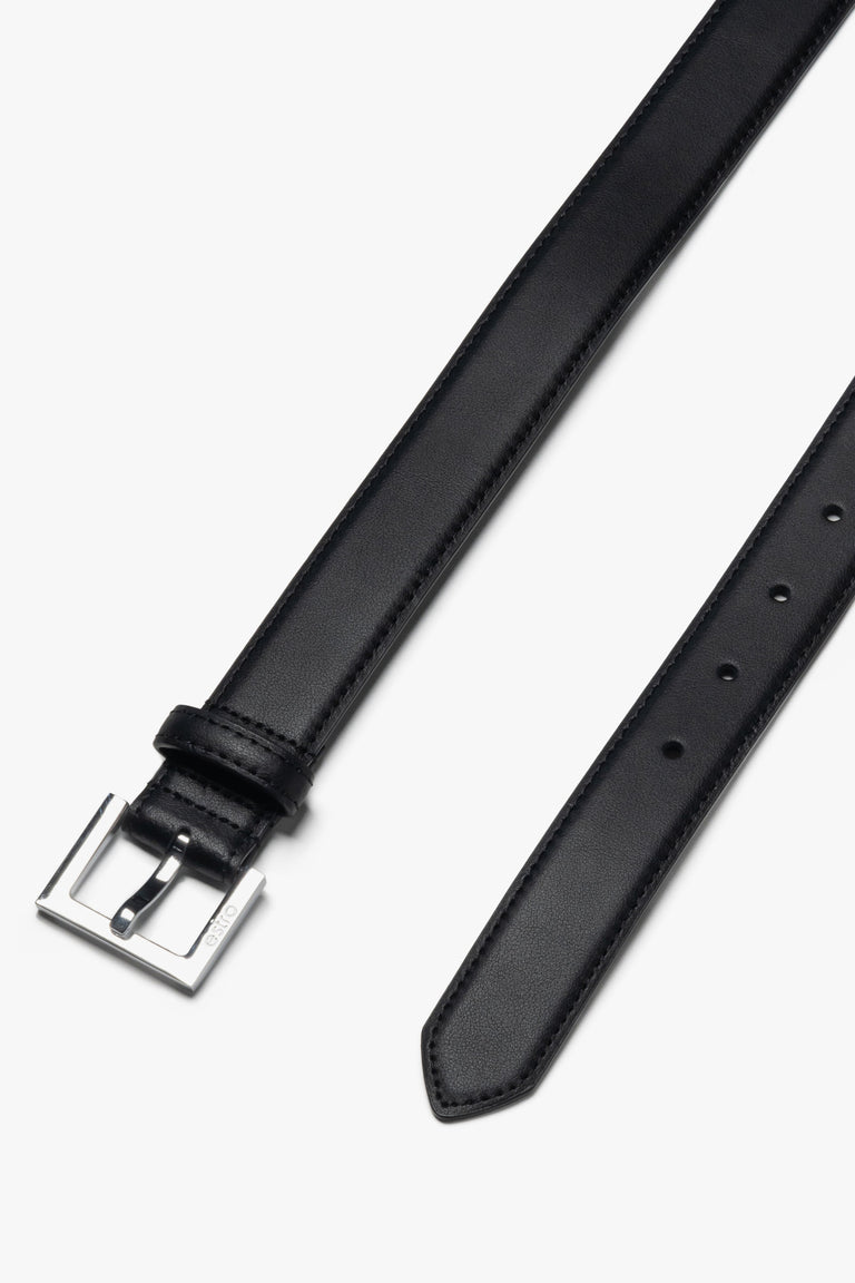 A black genuine leather belt by Estro (ER00116104), featuring classic silver hardware.