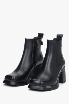 A pair of women's black ankle boots by Estro (ER00118210), crafted from genuine leather with a block heel.