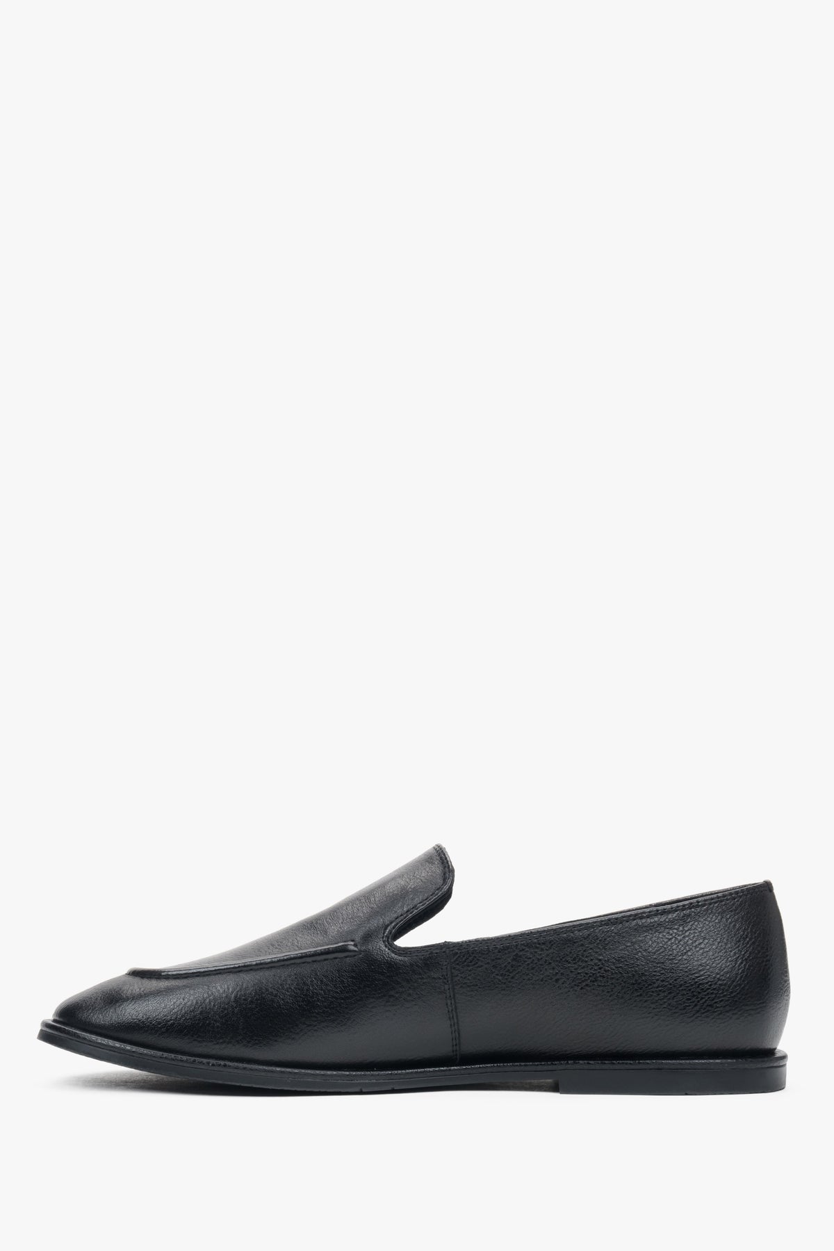 Women's black flat loafers featuring a genuine leather upper.