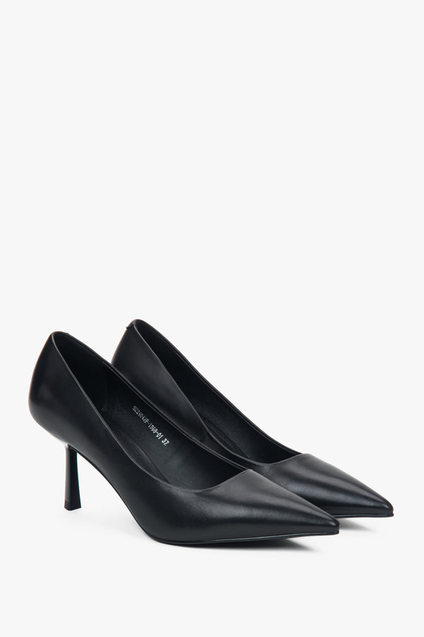A pair of women's pointed-toe pumps in black, crafted from genuine leather by Estro.