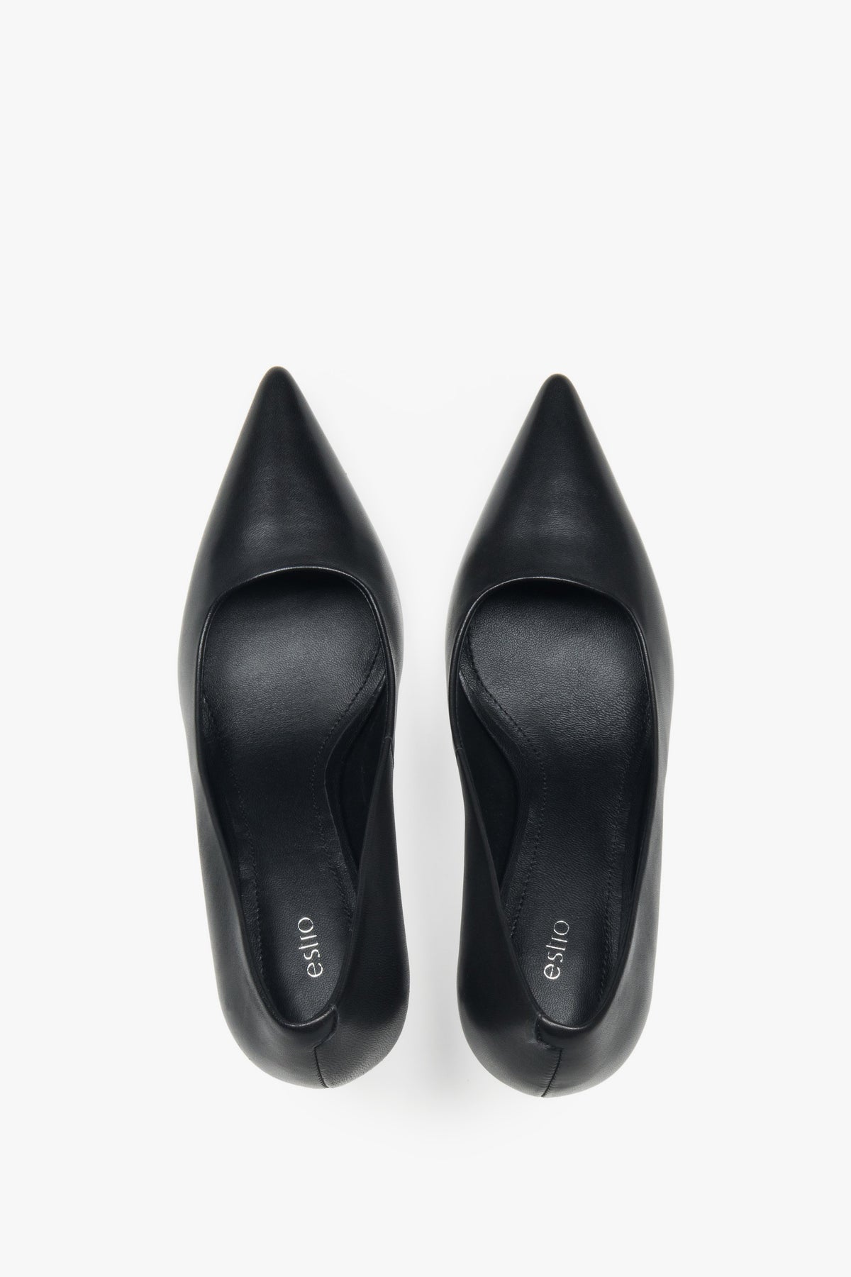 A pair of women's pointed-toe pumps made from genuine leather in a classic black color, by Estro.