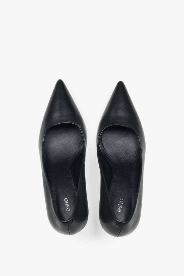 A pair of women's pointed-toe pumps made from genuine leather in a classic black color, by Estro.
