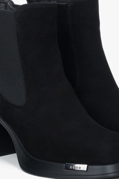 Women's black Estro ankle boots in soft suede, designed with a comfortable and stable heel.