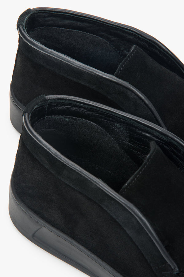 A pair of women's black loafers with a high-ankle silhouette, made from premium Italian velour by Estro.