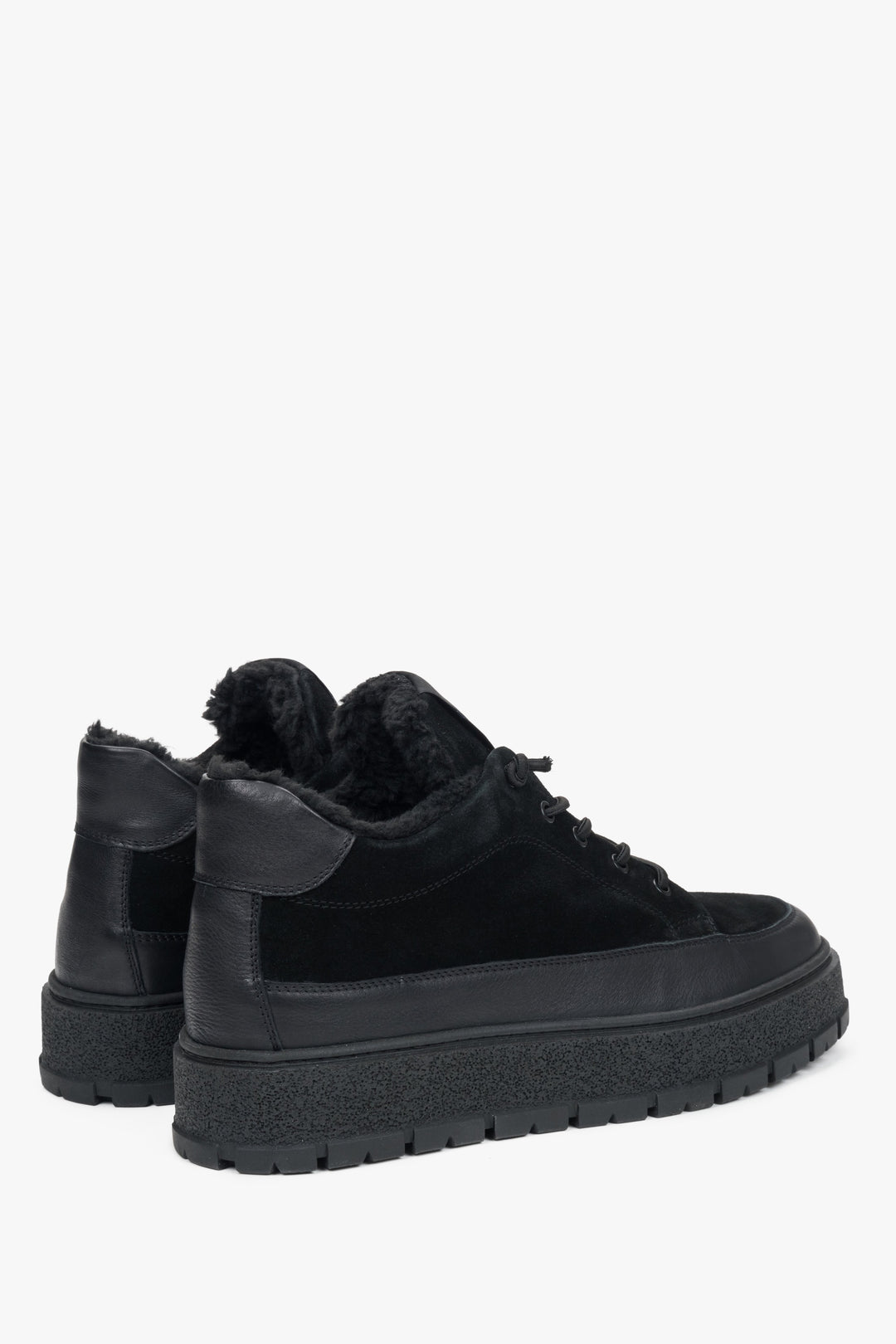 Side profile of the men's Estro black high-top sneaker, showing the premium velour and leather combination and fur lining.