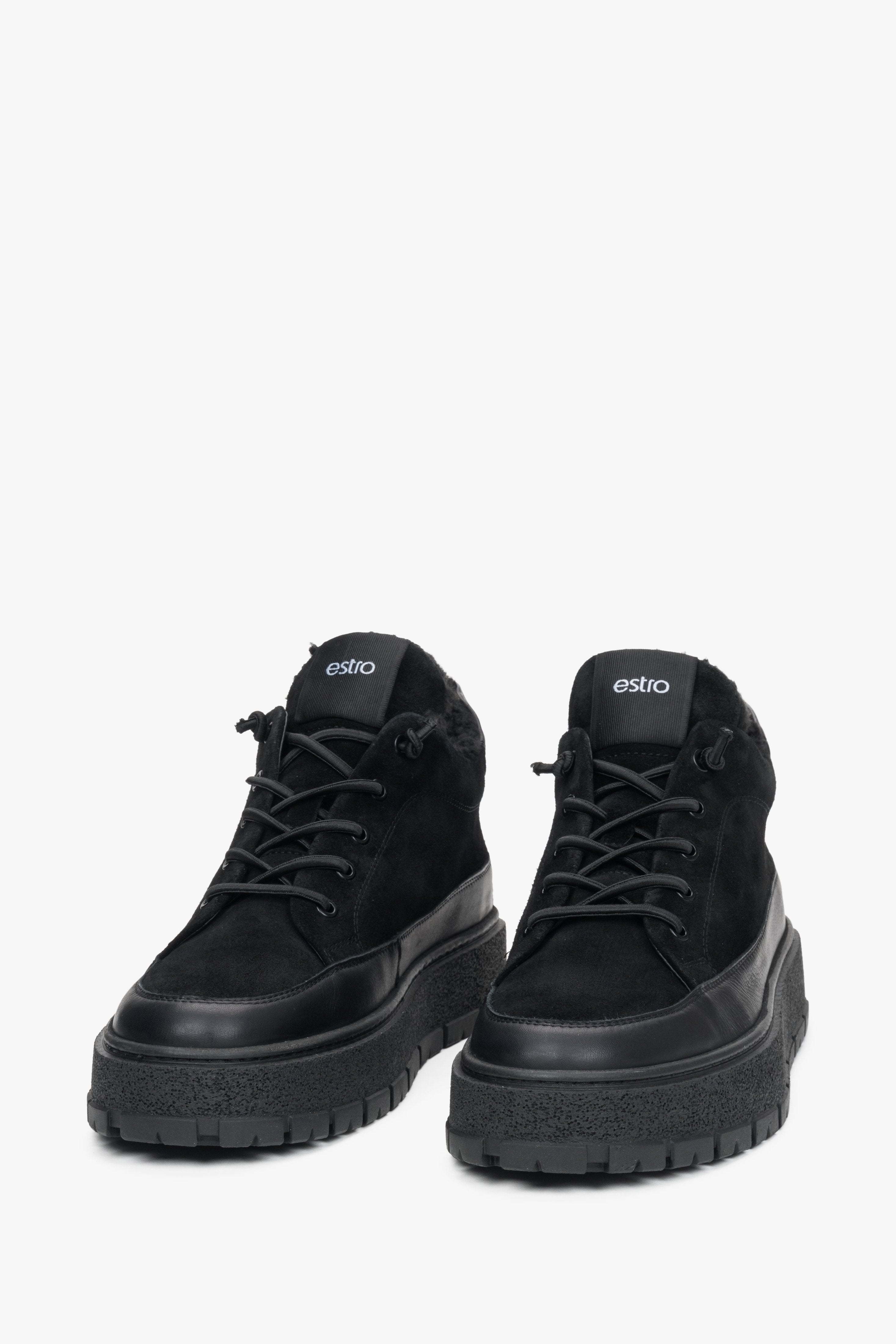 A pair of men's black high-top sneakers designed for warmth with a fur lining, made from Italian velour and leather by Estro.