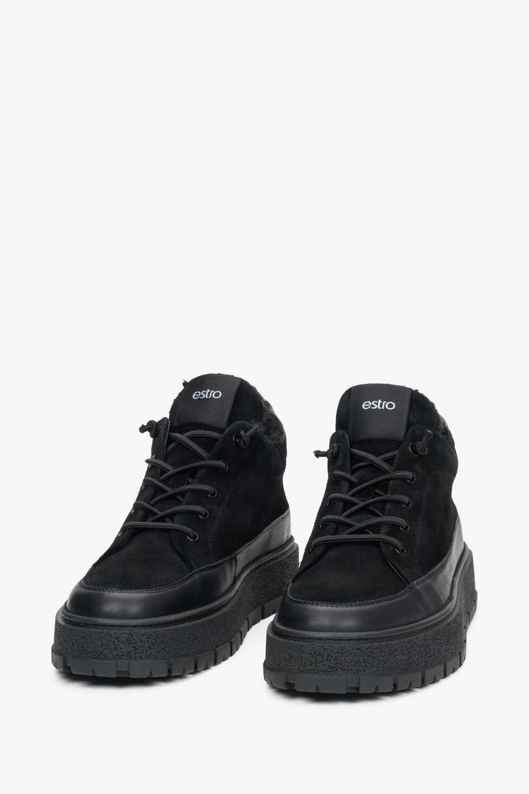 A pair of men's black high-top sneakers designed for warmth with a fur lining, made from Italian velour and leather by Estro.