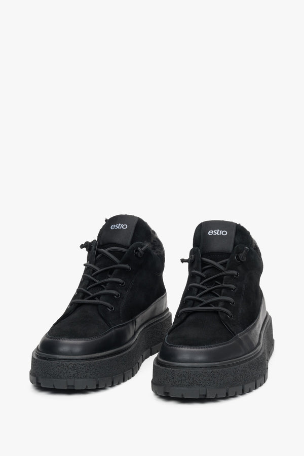 A pair of men's black high-top sneakers designed for warmth with a fur lining, made from Italian velour and leather by Estro.