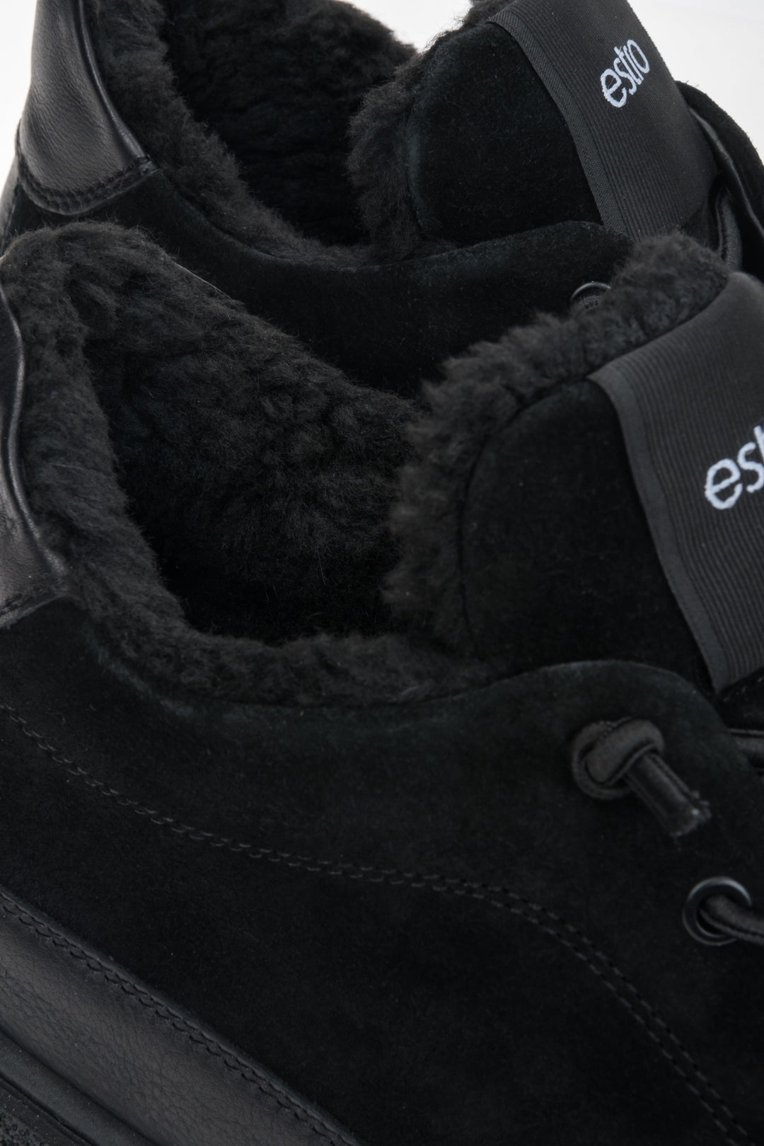 Men's black high-top sneakers featuring a fur lining and a premium Italian velour and leather upper.