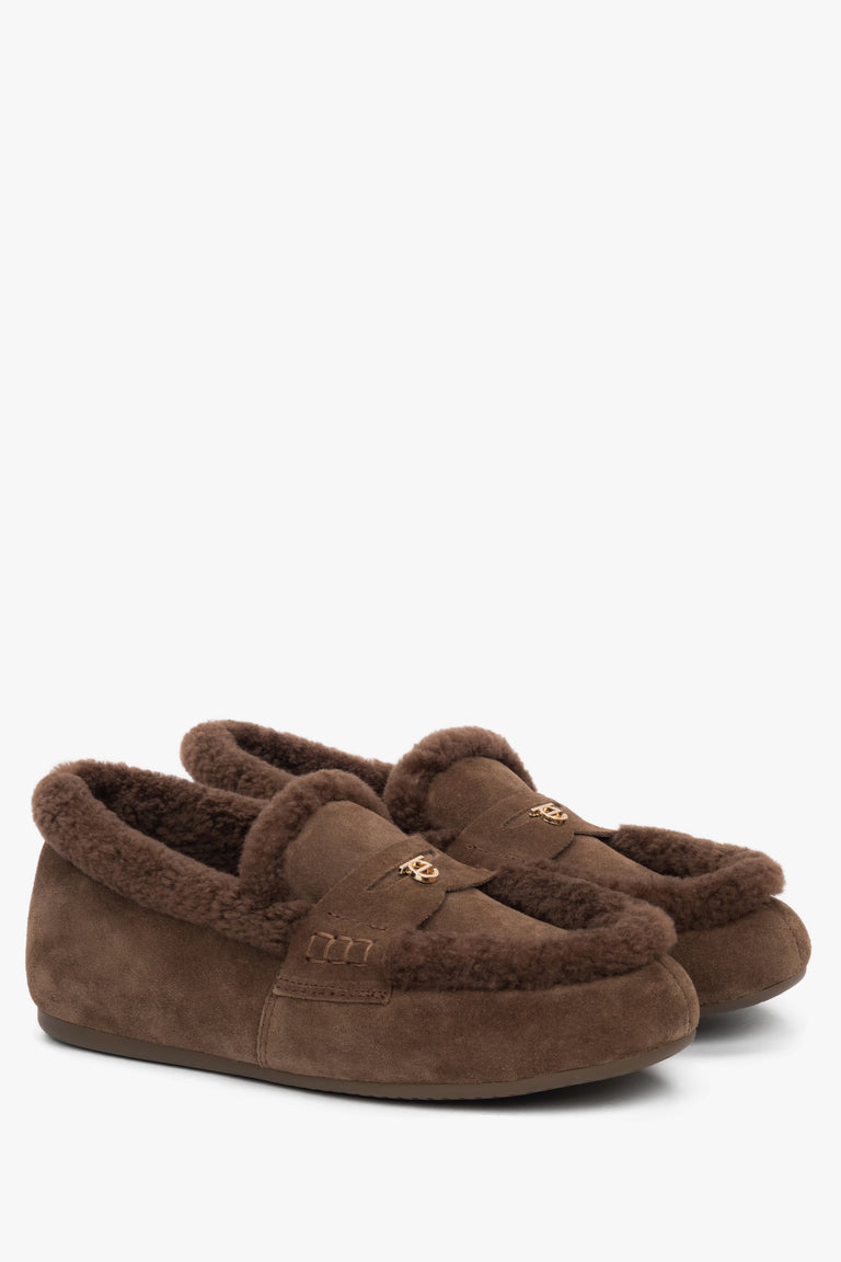 A pair of women's loafers in dark brown, crafted from genuine velour and lined with soft fur.