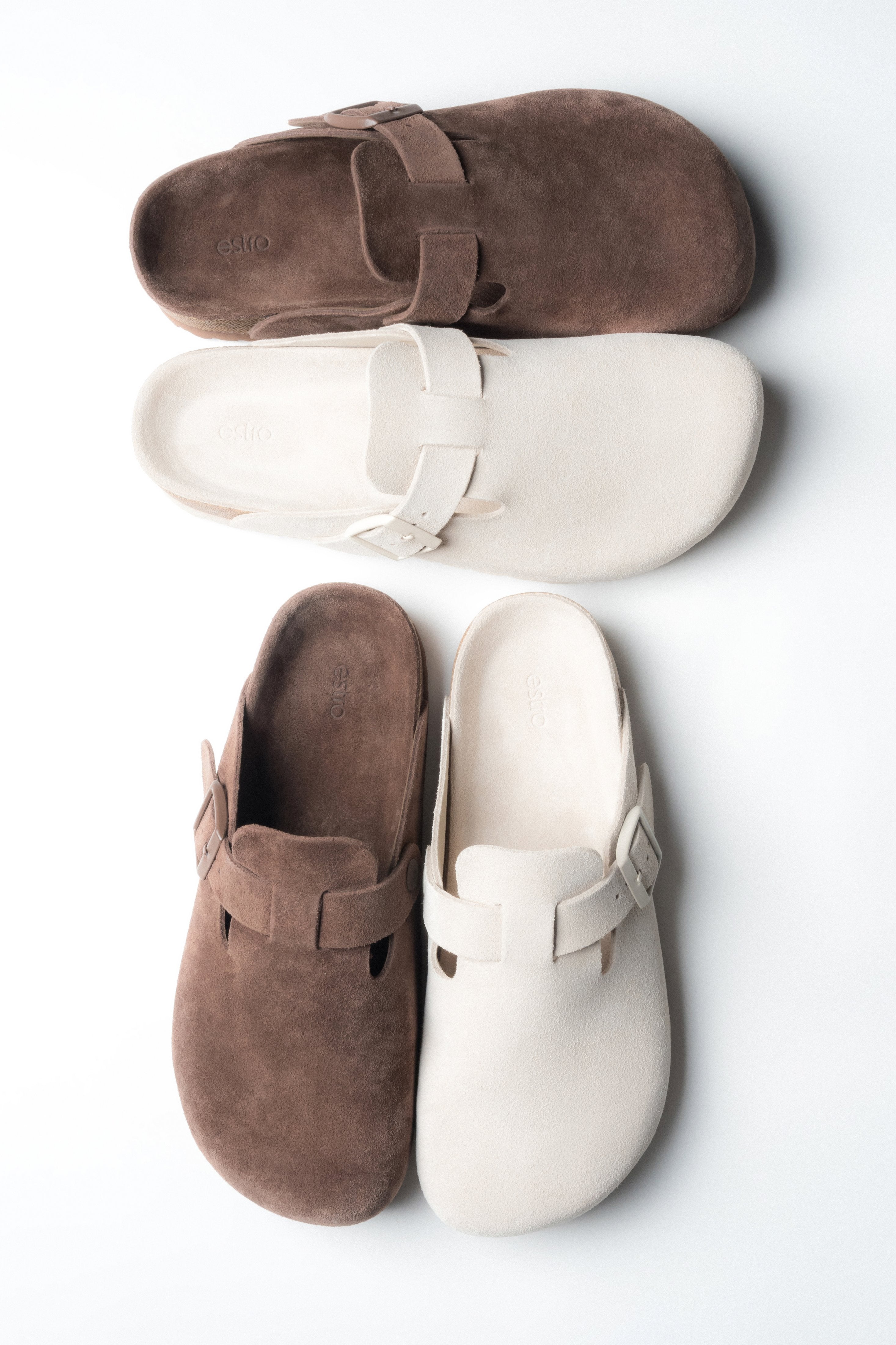 A pair of women's dark brown mules by Estro, crafted from soft genuine suede.