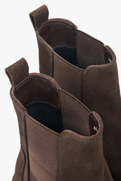 A pair of women's dark brown Chelsea boots with a high-ankle design, made from premium Italian velour by Estro.