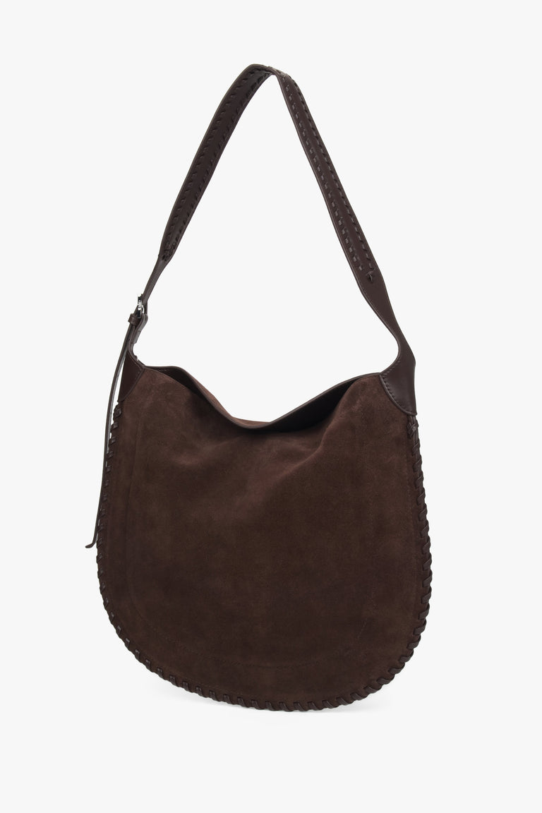 A dark brown shoulder bag for women by Estro, crafted from genuine velour.