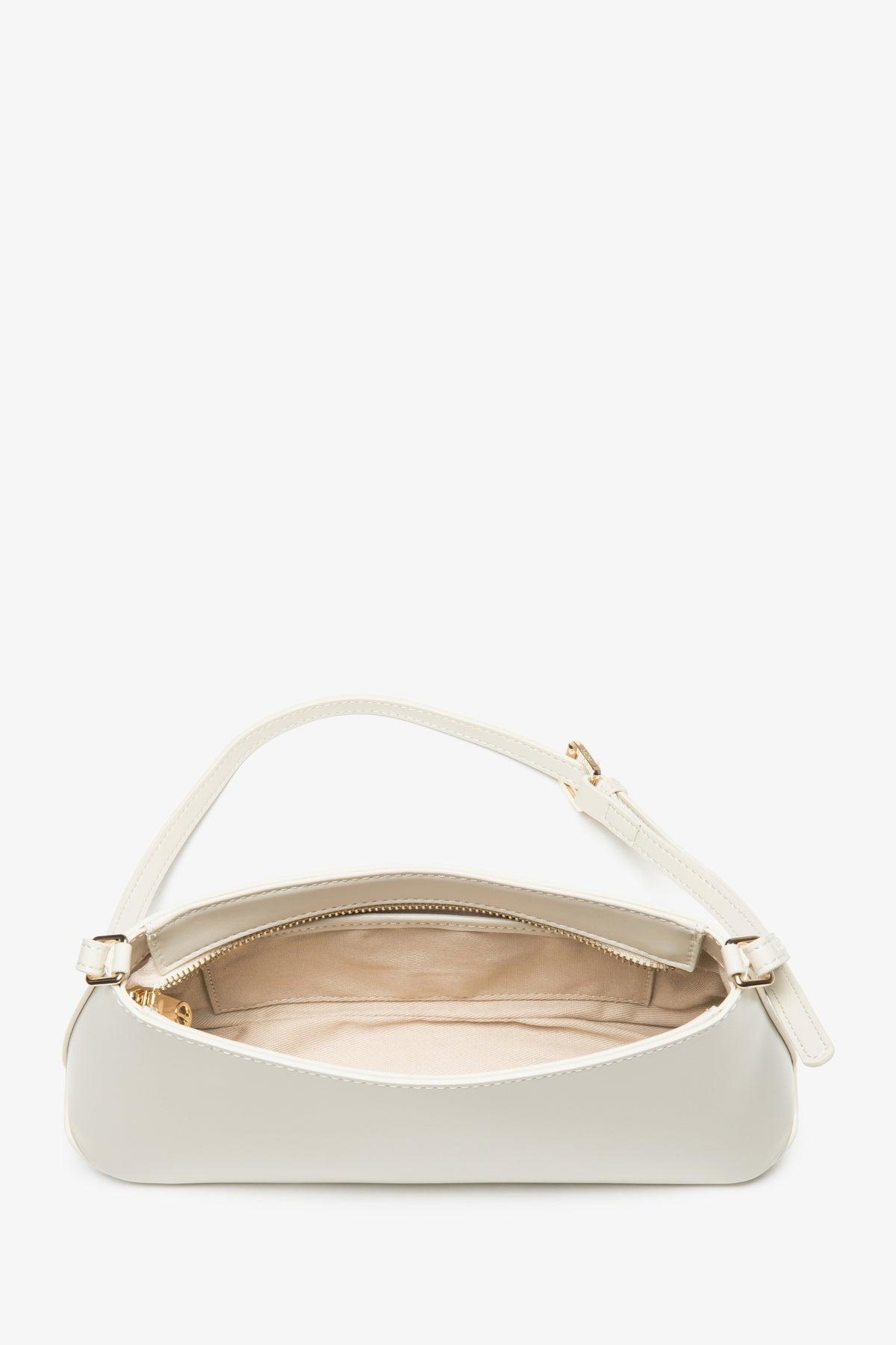 A women's shoulder bag crafted from classic genuine leather in a light beige color, by Estro.