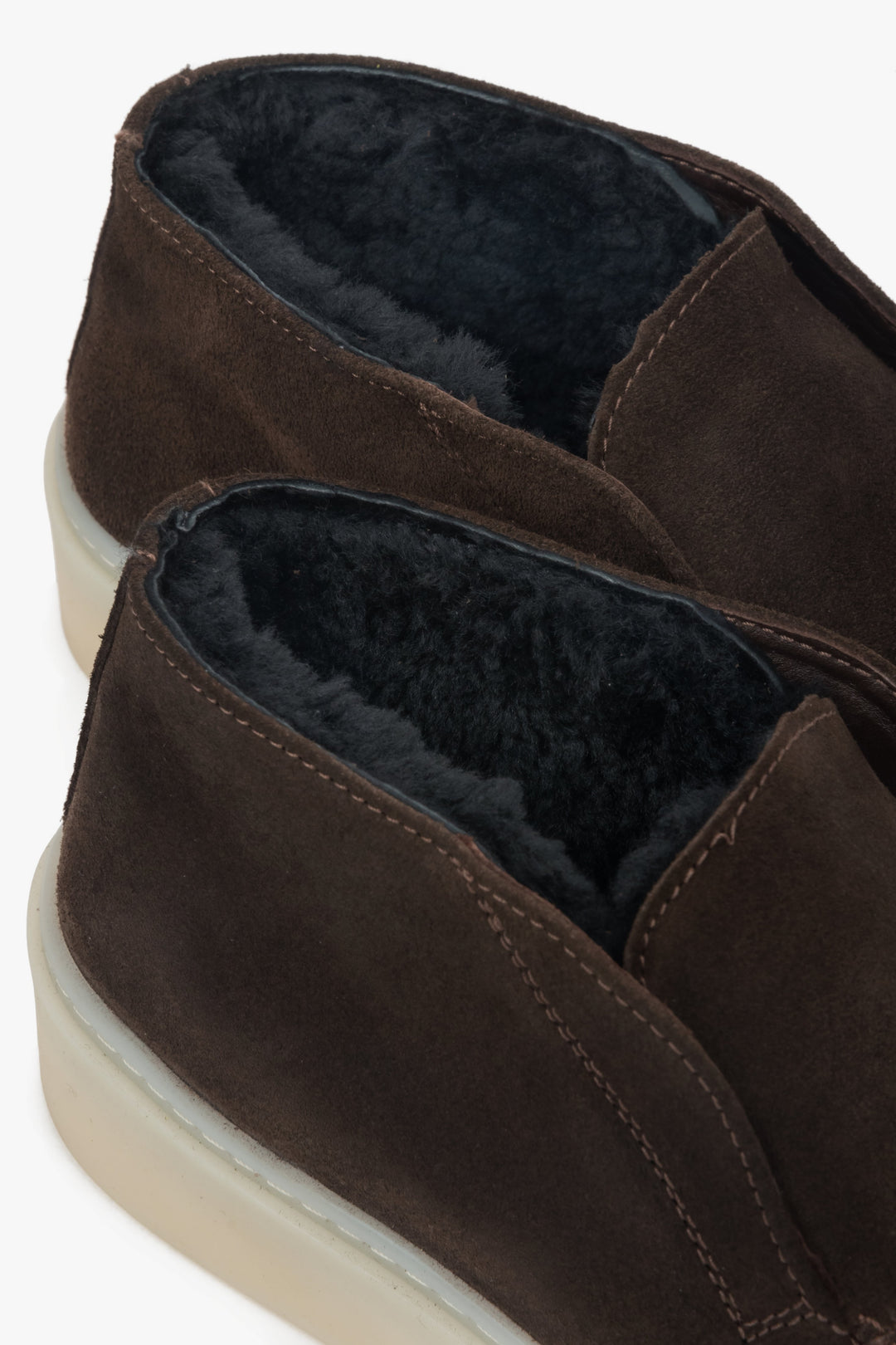 A pair of women's saddle brown loafers designed for winter, with a genuine Italian velour exterior and a cozy fur interior.