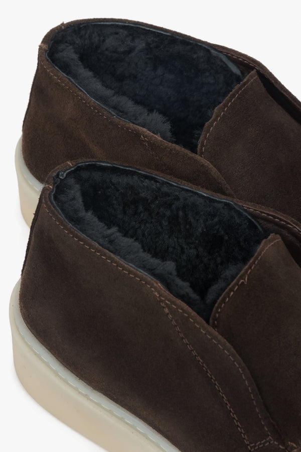 A pair of women's saddle brown loafers designed for winter, with a genuine Italian velour exterior and a cozy fur interior.