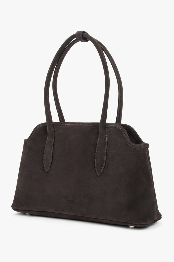 Side view of a women's saddle brown shoulder bag made of genuine Italian velour.