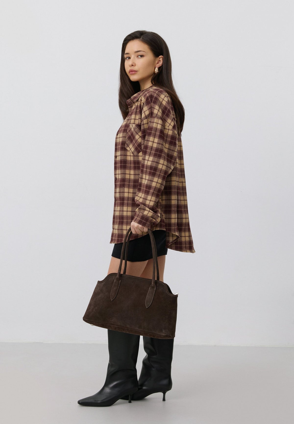 Women's Estro shoulder bag designed in saddle brown using genuine premium velour.