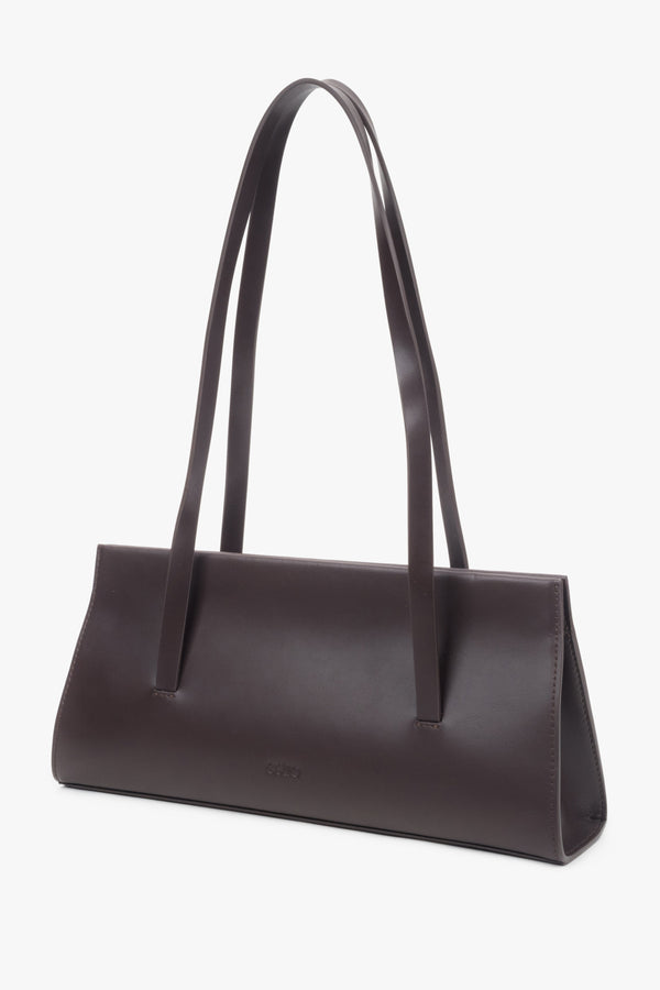 A saddle brown leather shoulder bag for women by Estro featuring long handles.