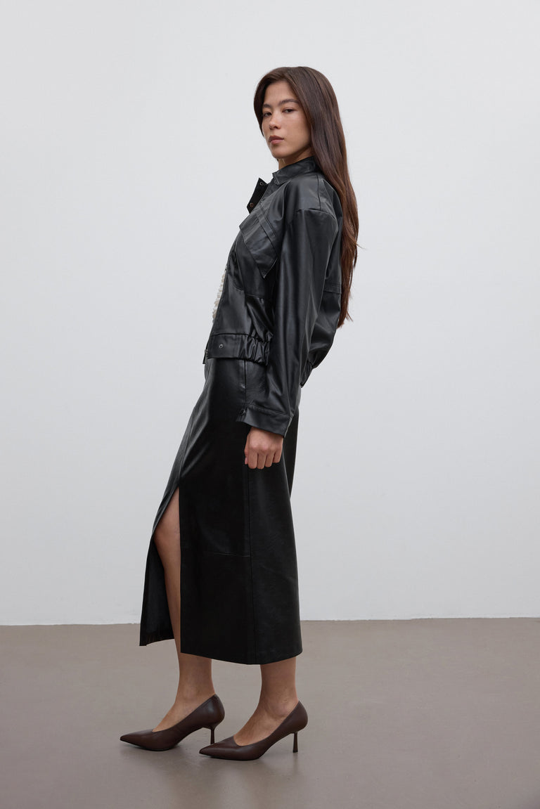 Women's Estro pointed-toe pump, showing the saddle brown genuine leather and heel.