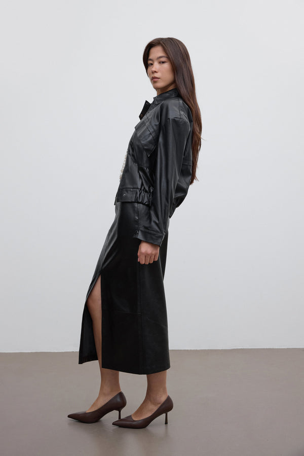 Women's Estro pointed-toe pump, showing the saddle brown genuine leather and heel.