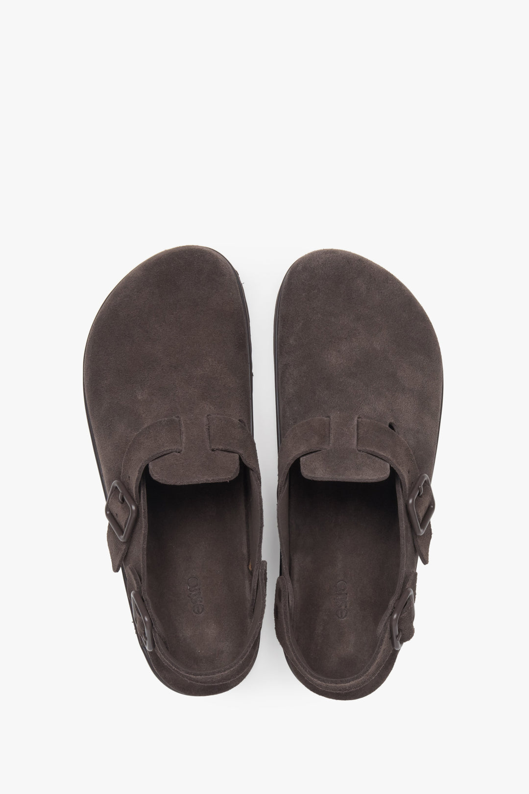 Women's saddle brown closed-toe clogs featuring a genuine velour upper.