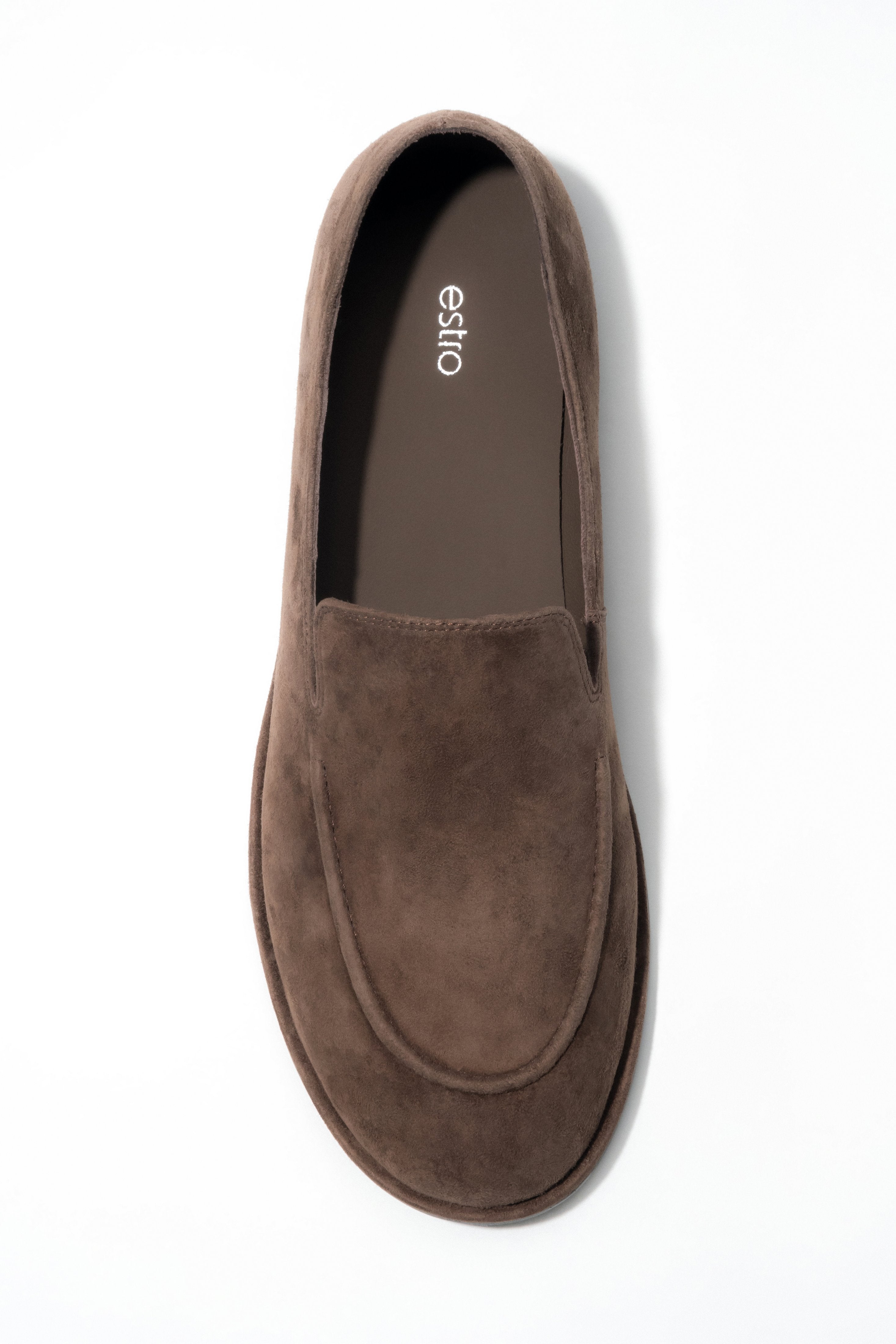 A pair of women's flat loafers made from genuine velour in a rich saddle brown color, by Estro.

