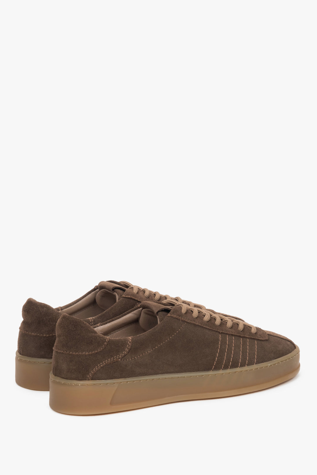 Side profile of the women's Estro low-top sneaker, showing the saddle brown premium Italian velour texture.