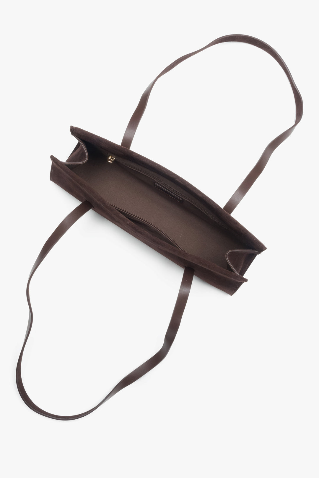 A women's shoulder bag by Estro, crafted from soft saddle brown velour and designed with long handles.