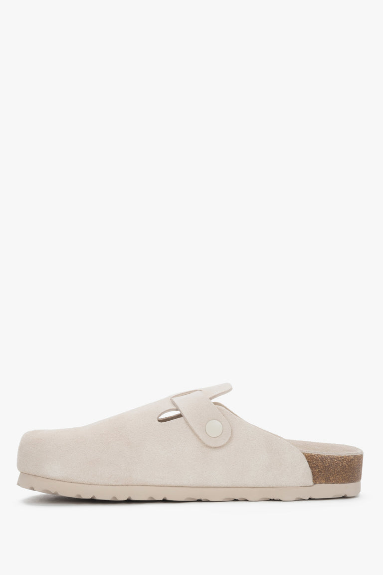 A pair of women's slides in a white clog style, crafted from genuine velour by Estro.